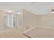 Hallway with mirrored wall and tile floors at 3234 Jackson Dr, Holiday, FL 34691
