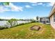 Backyard with water view and garden at 3234 Jackson Dr, Holiday, FL 34691