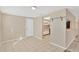 Simple dining area with tile floors and view of kitchen at 3234 Jackson Dr, Holiday, FL 34691