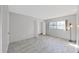 Bedroom featuring bright natural light and tile flooring at 1370 Heather Ridge Blvd # 107, Dunedin, FL 34698