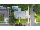 Bird's eye view of a house and surrounding area at 1921 Blue Heron Way, Palm Harbor, FL 34683