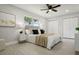 Bedroom with queen bed, nightstands, and closet at 1921 Blue Heron Way, Palm Harbor, FL 34683