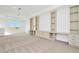 Large bonus room with built-in shelving and cabinets at 32252 Wetland Bird Vw, San Antonio, FL 33576