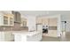 Modern kitchen with stainless steel appliances and light-colored cabinetry at 32252 Wetland Bird Vw, San Antonio, FL 33576
