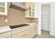Modern kitchen features stainless steel appliances and ample cabinetry at 32252 Wetland Bird Vw, San Antonio, FL 33576