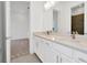 Clean bathroom with double vanity and modern fixtures at 32252 Wetland Bird Vw, San Antonio, FL 33576