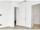 Spacious bedroom with doors to other rooms at 32252 Wetland Bird Vw, San Antonio, FL 33576