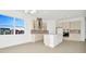 Modern kitchen with an island and stainless steel appliances at 32252 Wetland Bird Vw, San Antonio, FL 33576