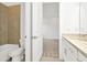 Modern bathroom with neutral tile and a shower/tub combo at 32252 Wetland Bird Vw, San Antonio, FL 33576