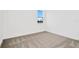 Simple bedroom with neutral wall and carpet at 32252 Wetland Bird Vw, San Antonio, FL 33576