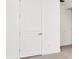 White closet with simple door at 32252 Wetland Bird Vw, San Antonio, FL 33576