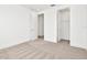 Spacious bedroom with a large closet and neutral carpeting at 32252 Wetland Bird Vw, San Antonio, FL 33576