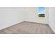 Bright bedroom with neutral carpet and large window at 32252 Wetland Bird Vw, San Antonio, FL 33576