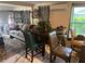 Cozy living room features a comfortable sofa and a small dining table at 1161 Kingsley St, Clearwater, FL 33756
