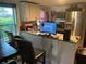 Kitchen with breakfast bar and stainless steel appliances at 1161 Kingsley St, Clearwater, FL 33756