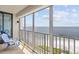 Spacious balcony boasting panoramic ocean and beach views at 7100 Sunset Way # 906, St Pete Beach, FL 33706