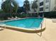 Inviting community pool with ample deck space for lounging at 4681 1St Ne St # 309, St Petersburg, FL 33703