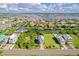 Picturesque aerial view of home with waterfront access, neighborhood, and nearby marina on canal at 6419 Marbella Blvd, Apollo Beach, FL 33572
