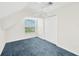 Bedroom with carpet, a window and closet doors at 6419 Marbella Blvd, Apollo Beach, FL 33572