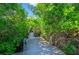Pathway leads to private boat dock and waterfront access at 6419 Marbella Blvd, Apollo Beach, FL 33572