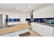 Well-equipped kitchen featuring granite countertops, stainless steel appliances, and ample cabinet space at 6419 Marbella Blvd, Apollo Beach, FL 33572