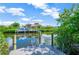 Beautiful waterfront home with a private dock, offering direct access to the water for boating and recreation at 6419 Marbella Blvd, Apollo Beach, FL 33572