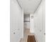 Clean hallway with tile floors and built in storage at 500 Treasure Island Cswy # 406, Treasure Island, FL 33706