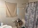 Bathroom with tub shower, toilet and vanity at 120 S San Remo Ave, Clearwater, FL 33755