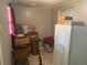 Small office area with desk, chair, and refrigerator at 120 S San Remo Ave, Clearwater, FL 33755