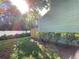 Private backyard with green lawn and privacy fence at 11335 Grandville Dr, Temple Terrace, FL 33617