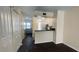 Kitchen with white cabinets and granite countertops at 11335 Grandville Dr, Temple Terrace, FL 33617