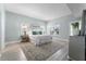Main bedroom with plush bedding and ocean views at 4950 Gulf Blvd # 104, St Pete Beach, FL 33706