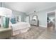 Spacious bedroom with a dresser and ocean view at 4950 Gulf Blvd # 104, St Pete Beach, FL 33706