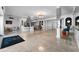 Elegant building lobby with marble floors and stylish seating at 4950 Gulf Blvd # 104, St Pete Beach, FL 33706