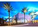 Dalí Museum with palm trees and outdoor lighting at night at 4950 Gulf Blvd # 104, St Pete Beach, FL 33706