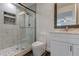 Updated bathroom with walk-in shower and vanity at 911 8Th Sw Ave, Largo, FL 33770