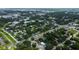 Aerial view of residential neighborhood showcasing numerous houses and tree-lined streets at 911 8Th Sw Ave, Largo, FL 33770