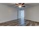 Bright bedroom with hardwood floors and ceiling fan at 911 8Th Sw Ave, Largo, FL 33770
