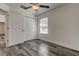 Spacious bedroom with window, closet, and ceiling fan at 911 8Th Sw Ave, Largo, FL 33770