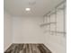 Large walk-in closet with wire shelving and hanging rods at 911 8Th Sw Ave, Largo, FL 33770