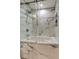Updated bathroom with a soaking tub and a walk-in shower at 911 8Th Sw Ave, Largo, FL 33770