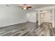 Spacious bedroom with ceiling fan, walk-in closet, and en-suite bathroom at 911 8Th Sw Ave, Largo, FL 33770