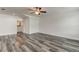 Spacious bedroom with ceiling fan, walk-in closet, and en-suite bathroom at 911 8Th Sw Ave, Largo, FL 33770