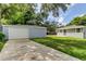 Detached garage with large driveway and backyard at 911 8Th Sw Ave, Largo, FL 33770