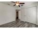 Bedroom with double door closet and ceiling fan at 911 8Th Sw Ave, Largo, FL 33770