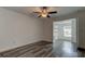 Spacious bedroom with hardwood floors and access to closet at 911 8Th Sw Ave, Largo, FL 33770