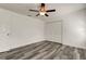 Bright bedroom with double doors to closet and vinyl flooring at 911 8Th Sw Ave, Largo, FL 33770