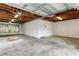 Garage with overhead door and extra storage space at 911 8Th Sw Ave, Largo, FL 33770