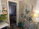 Entryway with a view into a bedroom and a console table at 1874 Douglas Ave, Clearwater, FL 33755