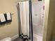 Bright bathroom with a shower/tub combo at 1874 Douglas Ave, Clearwater, FL 33755